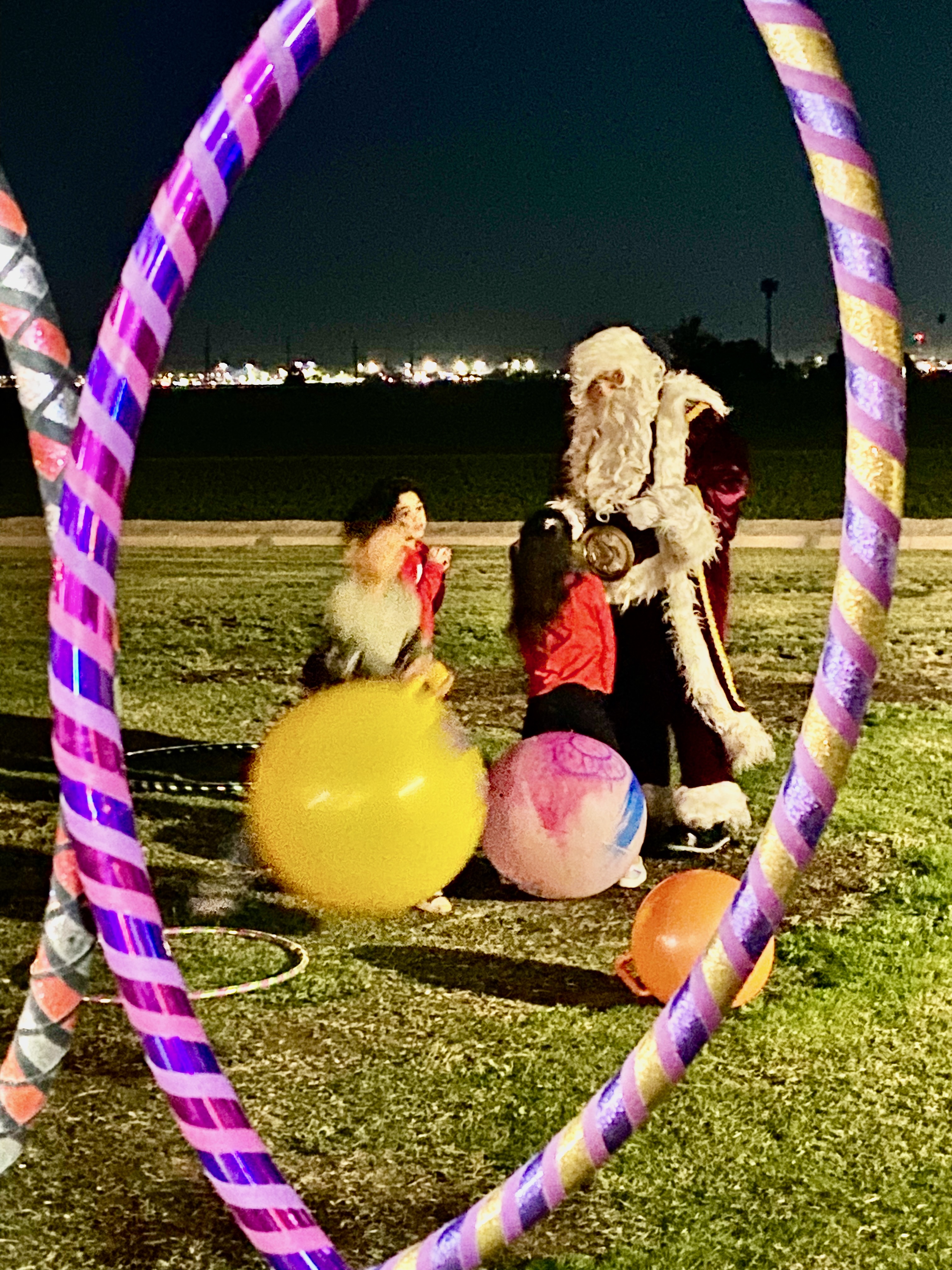 Holiday night event with hoops and Santa Claus
