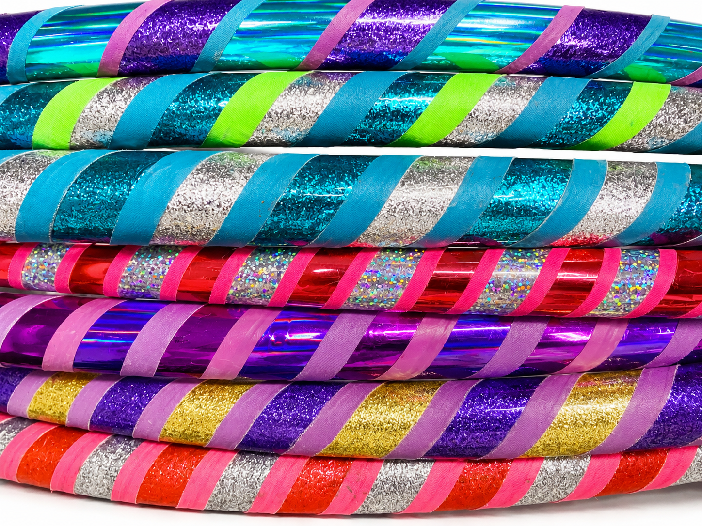 A dazzling stack of colorful Double Bling Sunshine Hoops with sparkle tape
