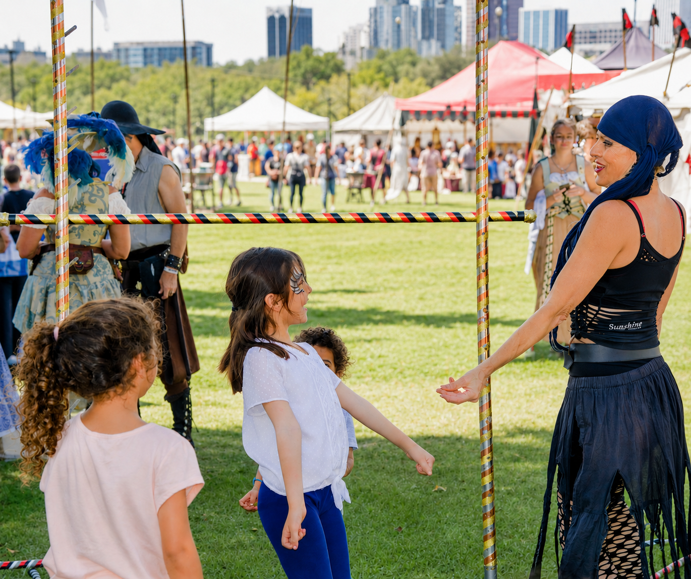 Sunshine Hoops instructor leading kids in limbo at a Renaissance festival